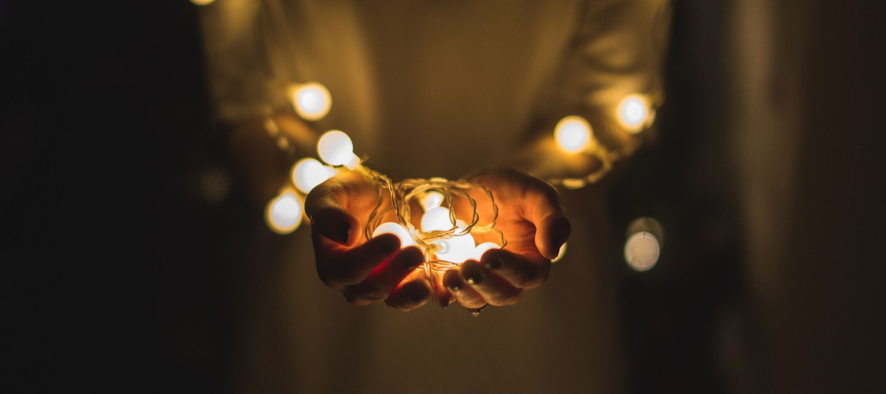 Heroic Fundraising Featured Image_Hands Glowing in Light