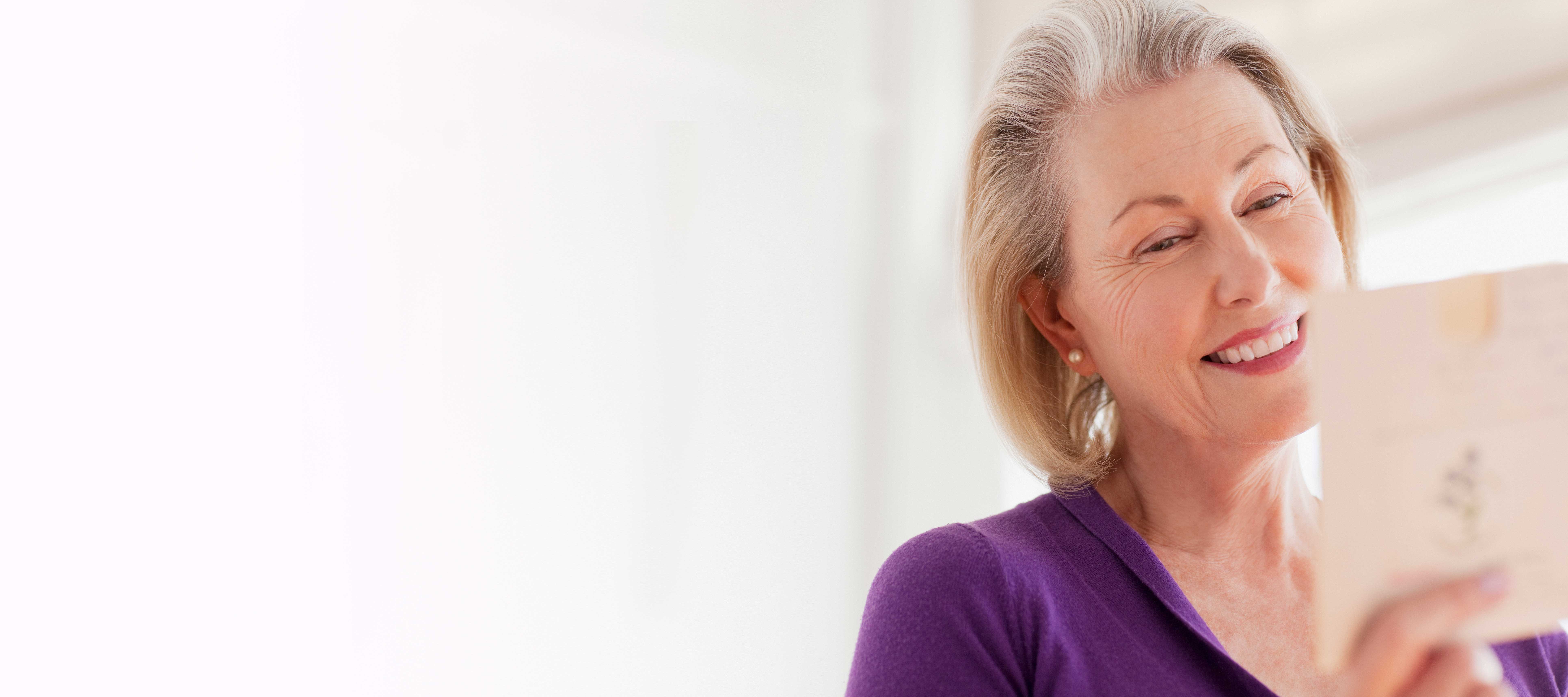 donor-looking-at-mail-heroic-fundraising-stock-photo