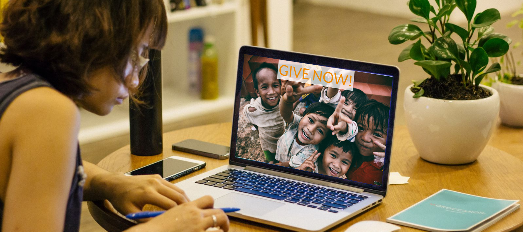 heroic fundraising featured image woman sustainer give computer online