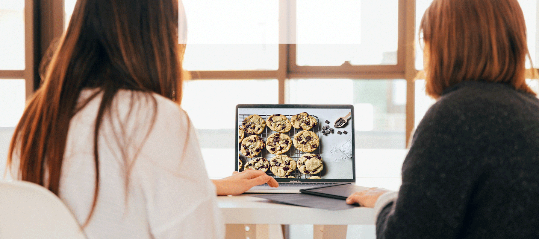 Heroic Fundraising Featured Image_Adults Looking at a Photo of Cookies on a Computer