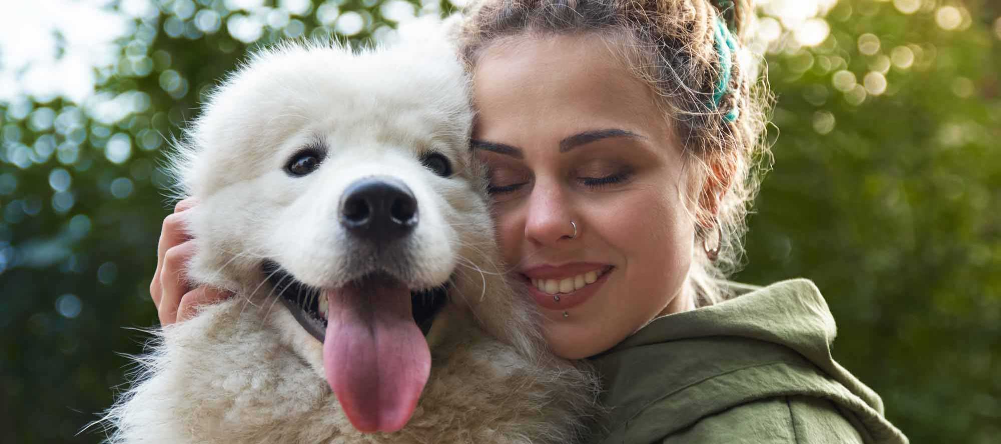 woman-with-dog-heroic-fundraising-featured-image