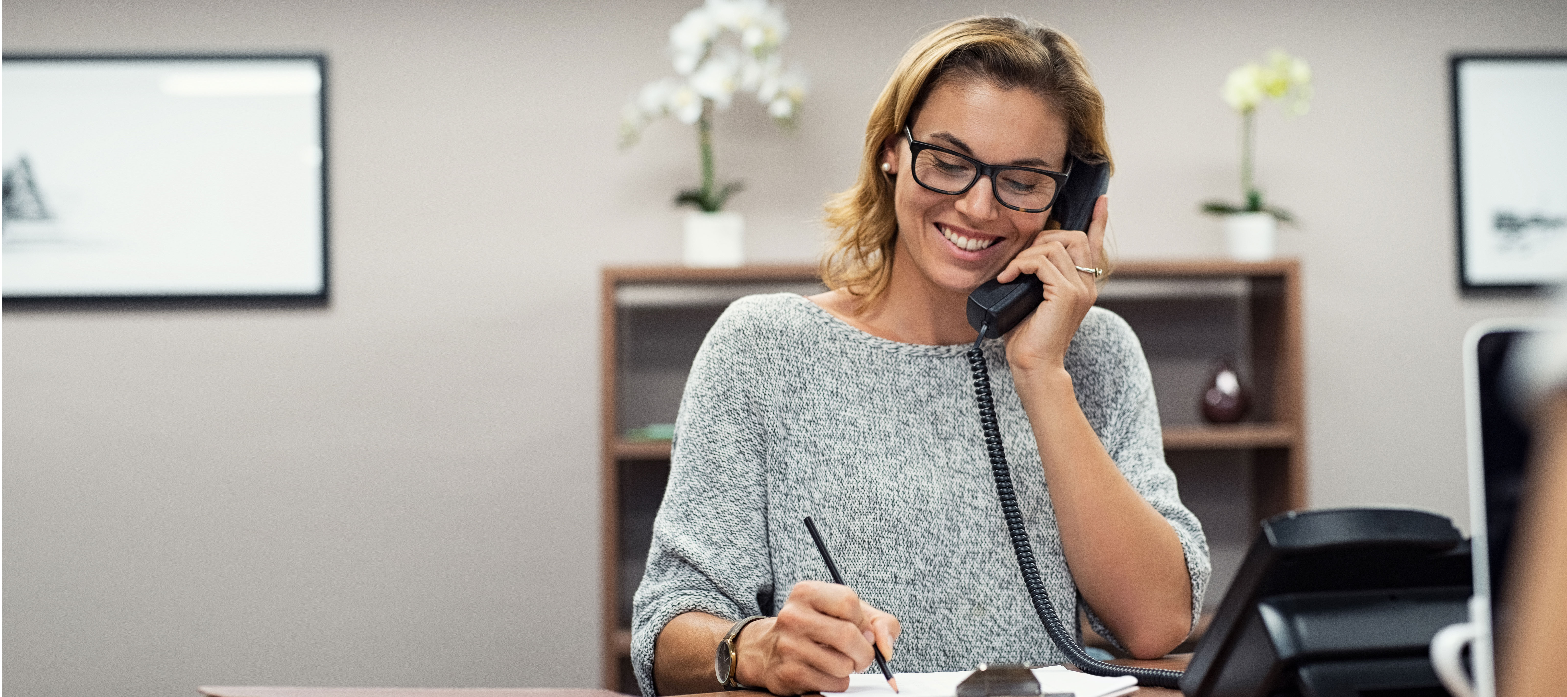 heroic-fundraising-featured-image-woman-on-telephone