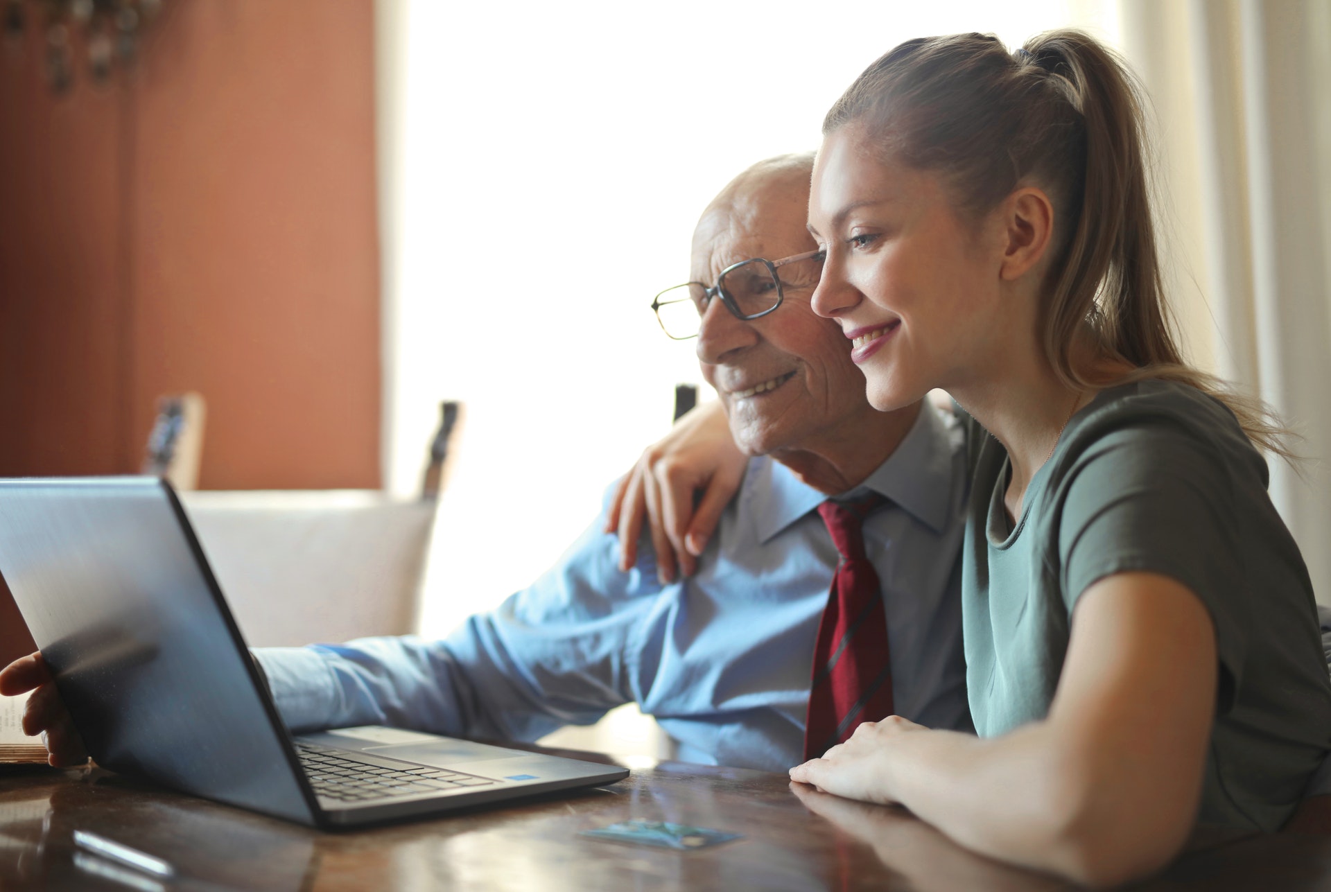 Heroic Fundraising Featured Image_Older adult and young adult reading on a laptop